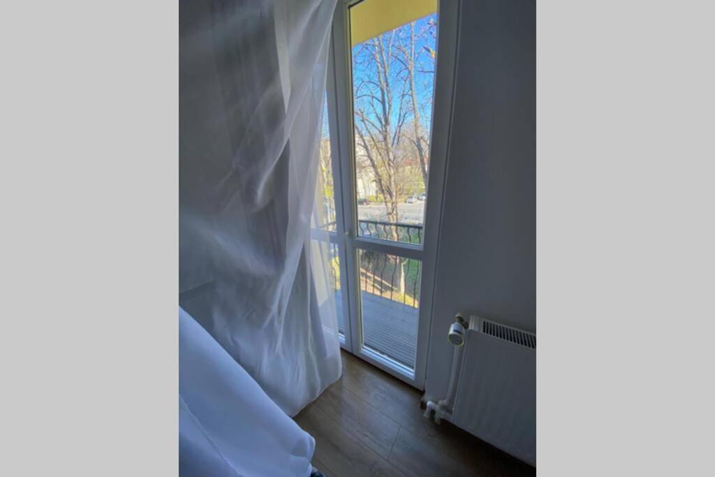 Cozy Apartment In The Business Area Of บูคาเรสต์ ภายนอก รูปภาพ